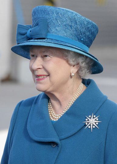 SOUTHAMPTON, ENGLAND - OCTOBER 11: Queen Elizabeth II smiles as she arrives to name Cunard's new cruise-liner Queen Elizabeth II in Southampton Docks on October 11, 2010 in Southampton, England. (Photo by Chris Jackson/Getty Images)