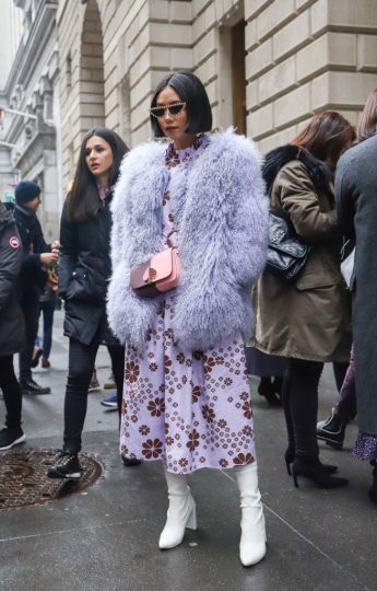 NEW YORK, NY - FEBRUARY 08: Olivia Lazuardy is seen wearing a lavender Sevange coat and Kate Spade dress on the street during New York Fashion Week  on February 8, 2019 in New York City. (Photo by Achim Aaron Harding/Getty Images)