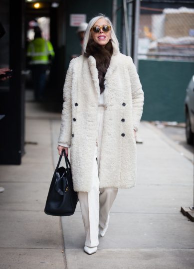 NEW YORK, NY - FEBRUARY 10: A guest  poses outside of the Tibi show wearing all white during New York Fashion Week on February 10, 2019 in New York City. (Photo by Donell Woodson/Getty Images)